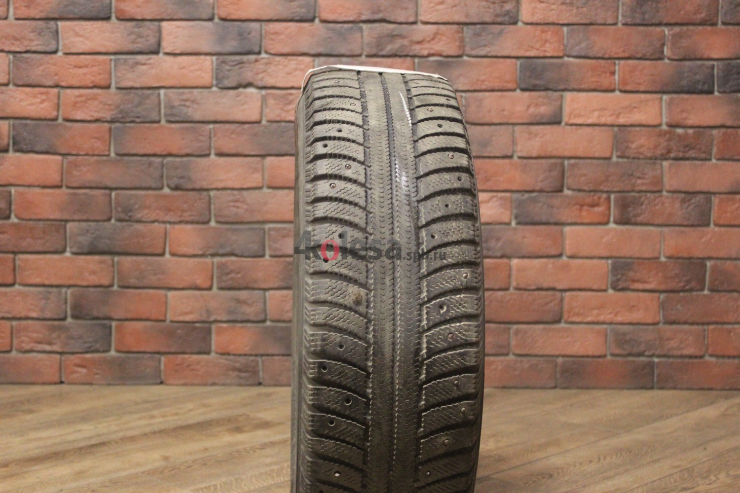 Зимние шипованные шины R15 195/65 Nokian Tyres Nordman бу (4-5 мм.) остаток шипов 25-49%