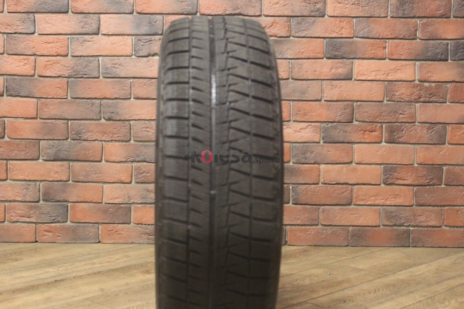 Зимние нешипованные шины R16 215/65 Bridgestone Blizzak Revo GZ бу Лип. (6-7 мм.)