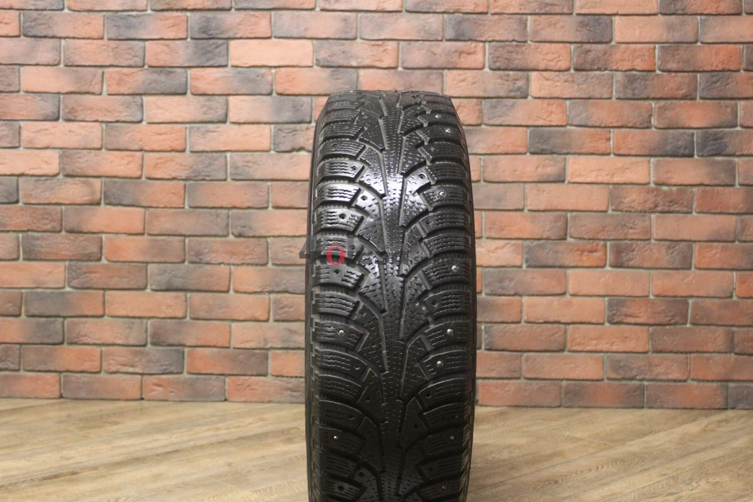 Зимние шипованные шины R16 215/70 Nokian Tyres Nordman 5 бу (6-7 мм.) остаток шипов 25-49%